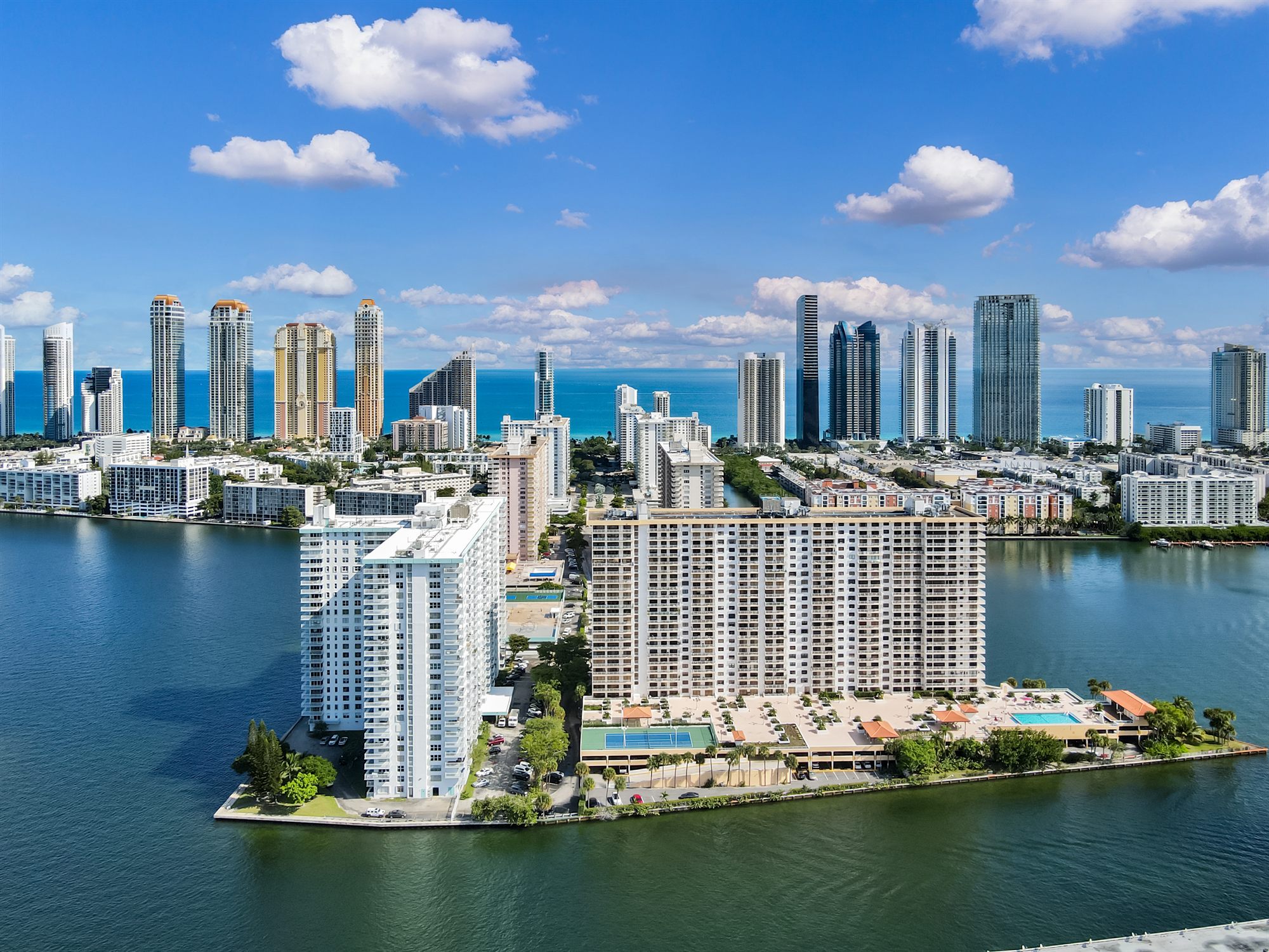 Aerial luxury waterfront property editing sample
